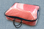 Упаковка «чемодан». Способ изготовления - сшивной. Материал: пленка ПВХ 100 мкм, жесткий кедер, 2 ручки-шнур, усиленные пластиком, люверсы. Размер 45х55х15 см, 2 «липы»